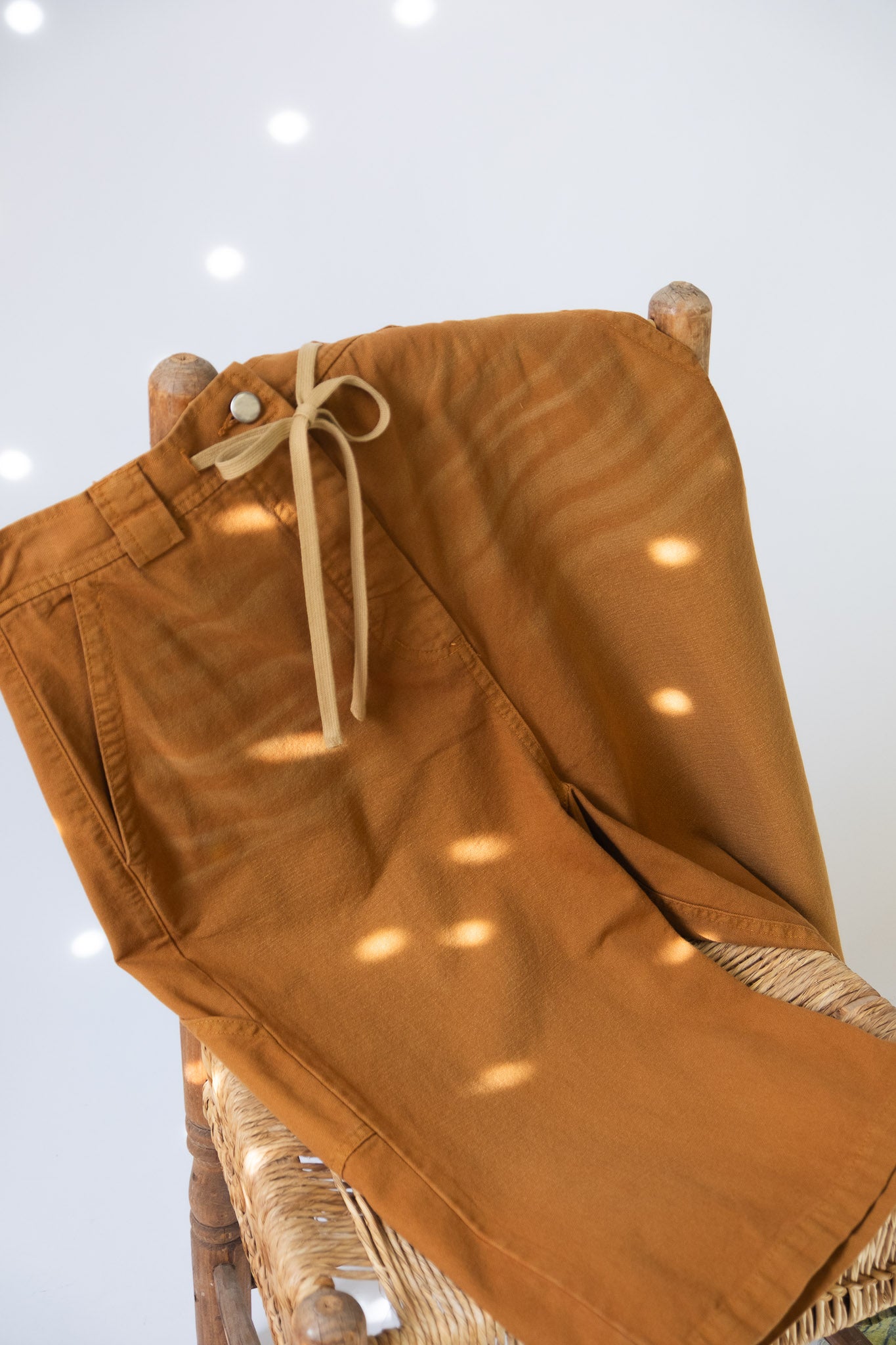 Raz Short in Gold Canvas