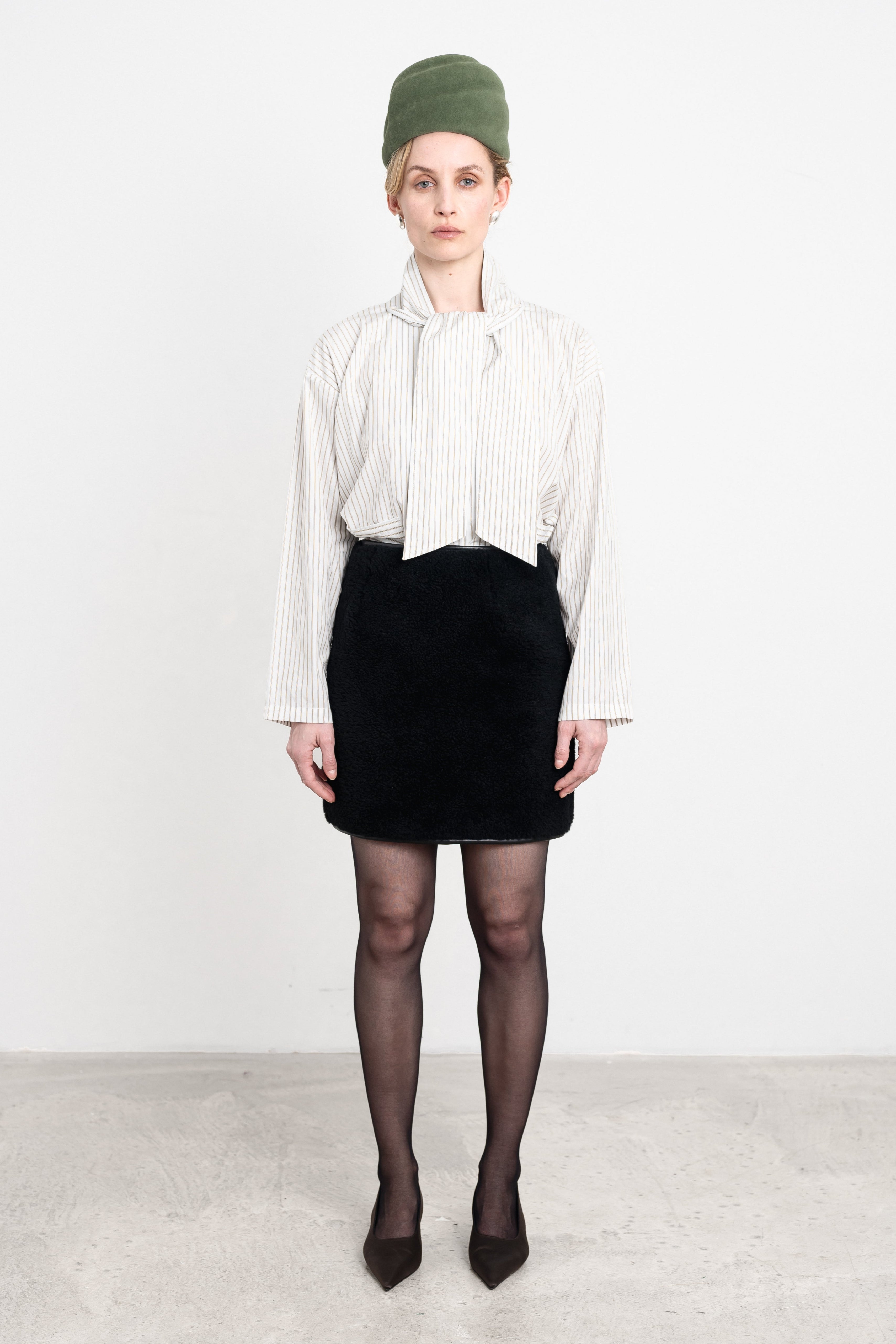 Sadie Mini Skirt in Black Leather Back Curly Hair Sheepskin – Recital