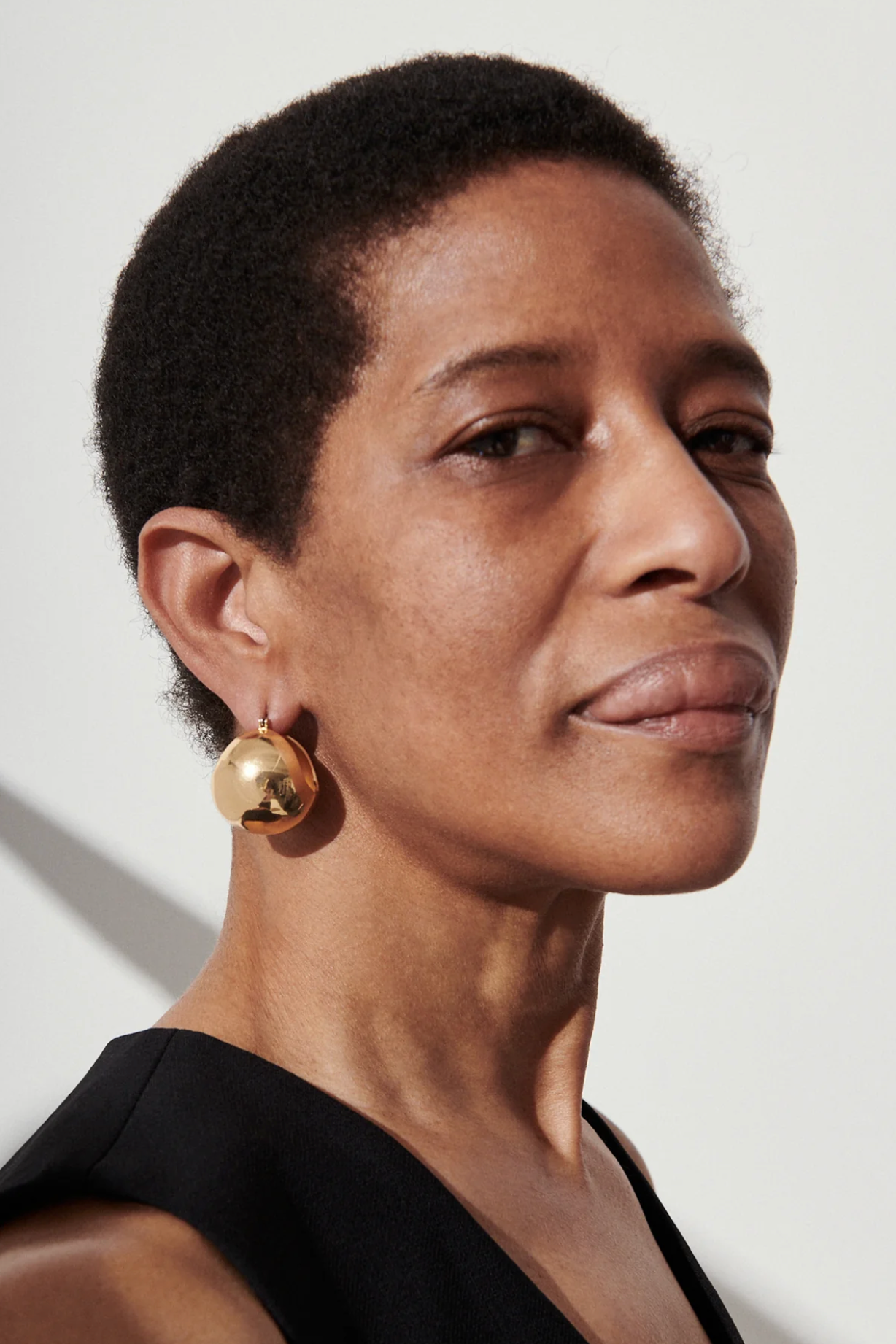 Large Keel Hoop in Gold by Rachel Comey