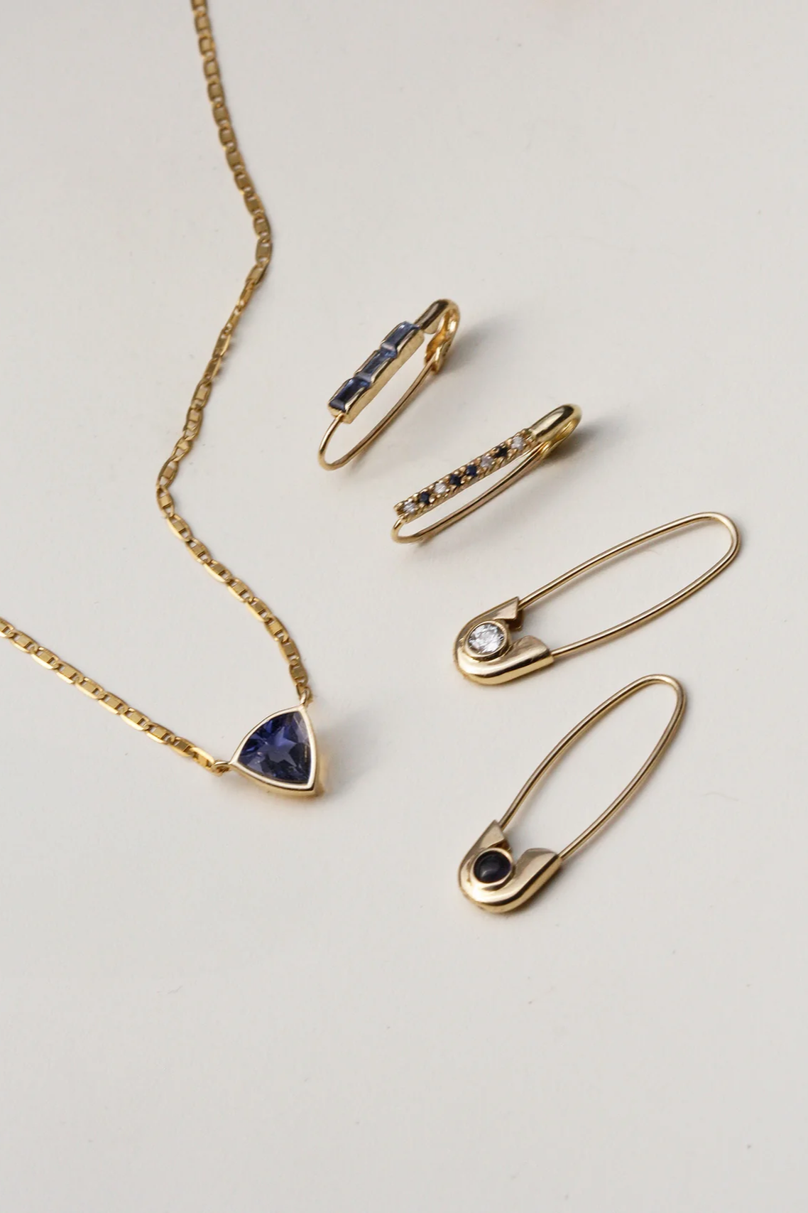 Mini Baguette Safety Pin Earring in 14k Yellow Gold & Blue Sapphires
